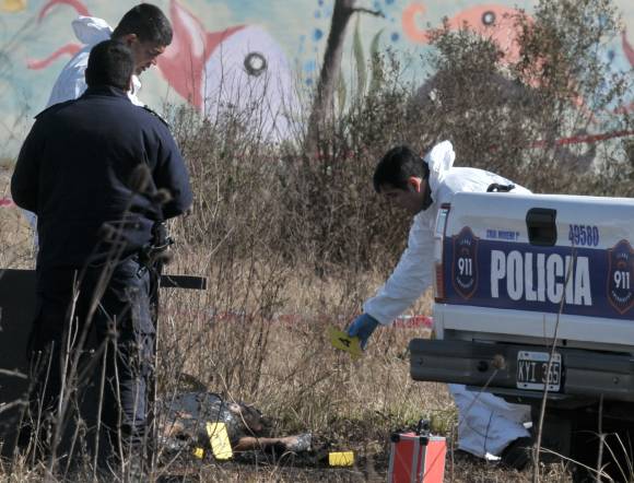 Decapitan a un  niño y a su padre  lo descuartizan