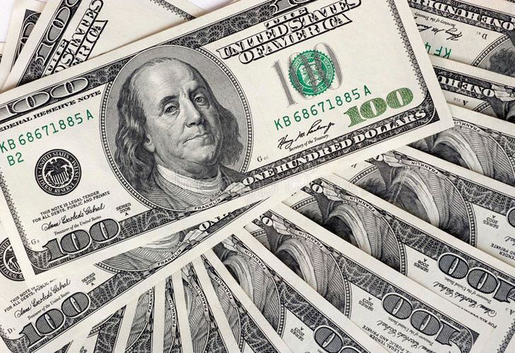 El dólar mayorista tuvo un alza récord de 12 centavos pero no superó los 61 pesos