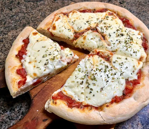 Recetas: cómo preparar la verdadera pizza porteña