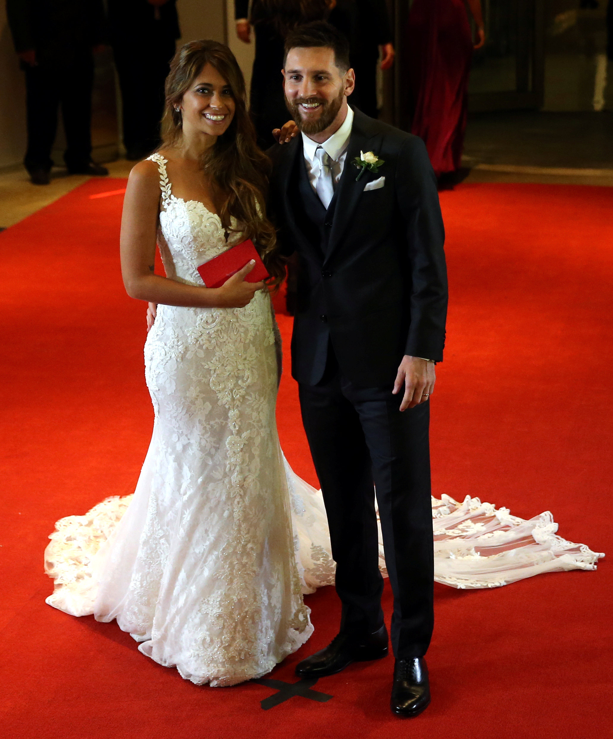 Argentine soccer player Lionel Messi and his wife Antonela Roccuzzo pose at their wedding in Rosario